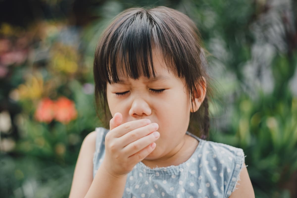 A child with a dry cough