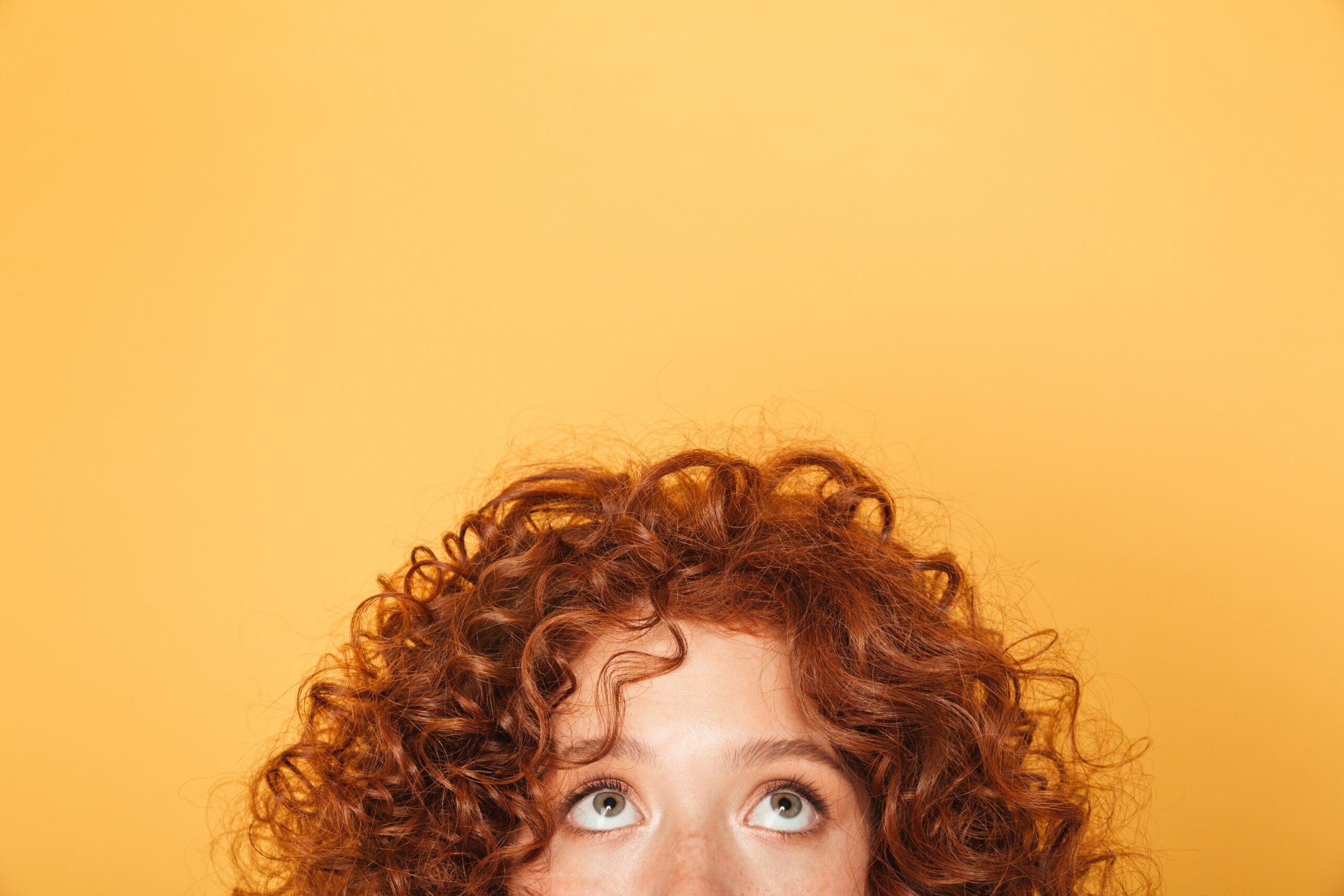 Does having red hair and moles multiply skin cancer risk?